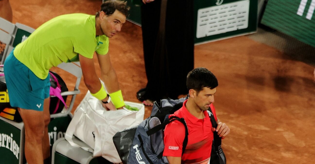 Serbia's Novak Djokovic walks off dejected after losing his quarter final match against Spain's Rafael Nadal at Roland Garros 2022