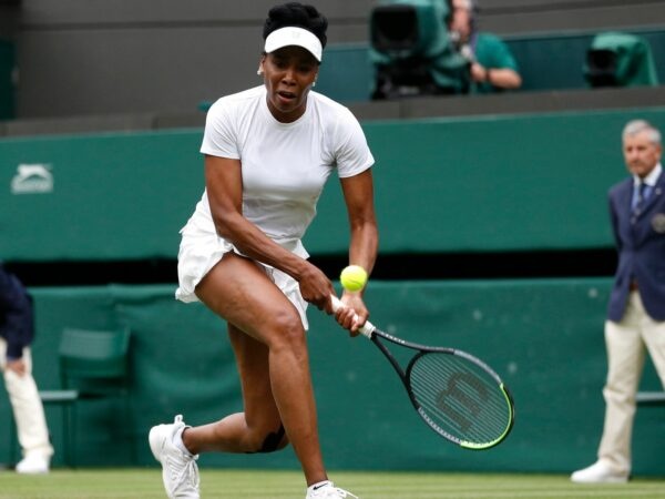 Venus Williams of the U.S. in action during her second round match against Tunisia's Ons Jabeur at Wimbledon in 2021