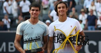 Carlos Alcaraz and Lorenzo Musetti, seen here with their Hamburg Open trophies, reach new-highs in the ATP rankings this week