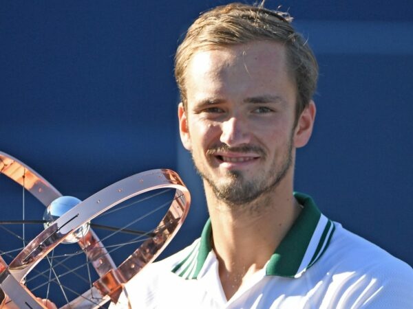 Daniil Medvedev of Russia poses with the trophy at the National Bank Open at Aviva Centre.