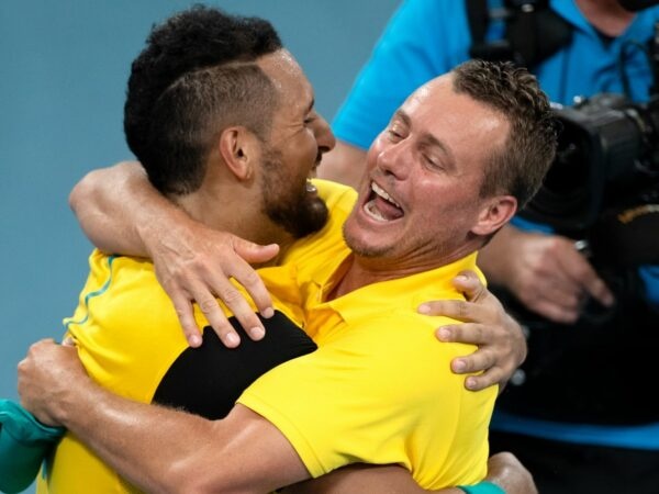 Lleyton Hewitt and Nick Kyrgios of Australia celebrate