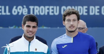 Spain's Carlos Alcaraz alongside compatriot Pablo Carreno Busta at the 2022 Barcelona Open