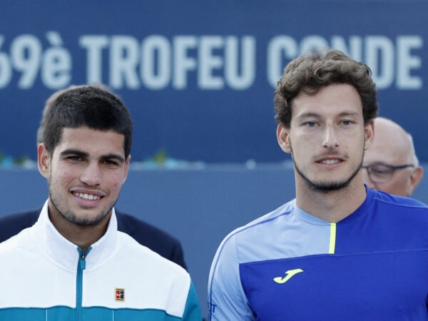 Spain's Carlos Alcaraz alongside compatriot Pablo Carreno Busta at the 2022 Barcelona Open