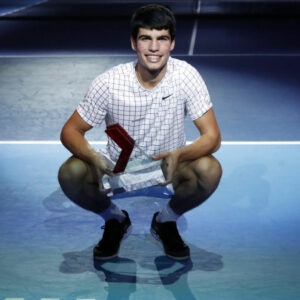 Carlos Alcaraz with the NextGen ATP Finals trophy in 2021