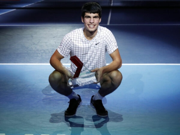 Carlos Alcaraz with the NextGen ATP Finals trophy in 2021