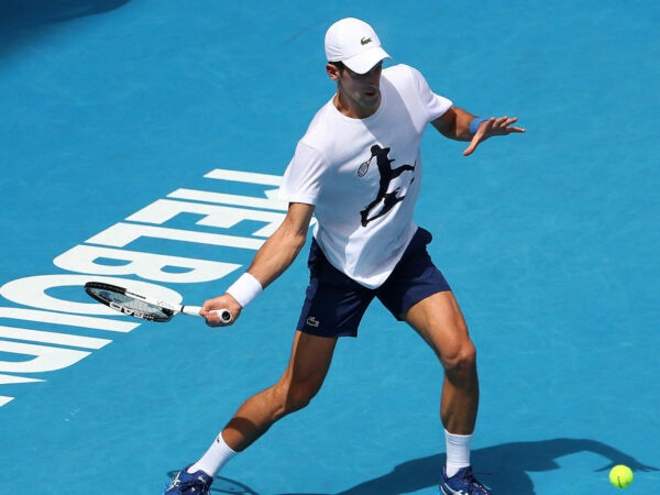 Novak Djokovic practices prior to the 2022 Australian Open