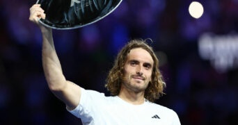 Stefanos Tsitsipas with the runners-up trophy after losing his final match against Serbia's Novak Djokovic at the 2023 Australian Open