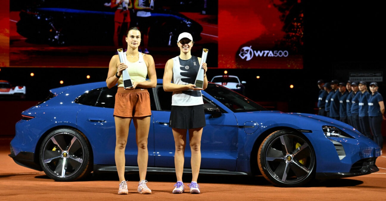 Aryna Sabalenka and Iga Swiatek with their trophies at the 2023 Porsche Grand Prix in Stuttgart
