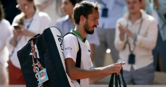 Daniil Medvedev leaves the court atfer his first round loss at the 2023 French Open