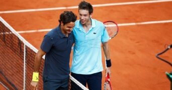 Roger Federer and Nicolas Mahut