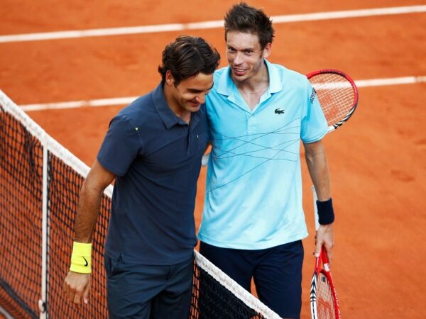 Roger Federer and Nicolas Mahut