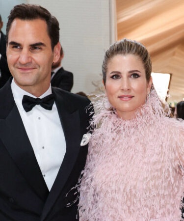 Roger Federer and his wife Mirka Federer pose at the Met Gala