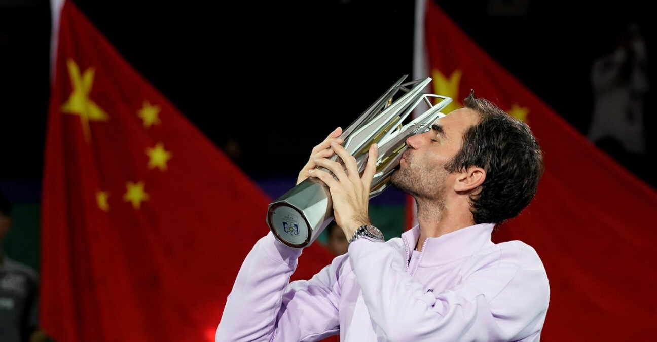Roger Federer with the winner's trophy at the ATP Shanghai Masters