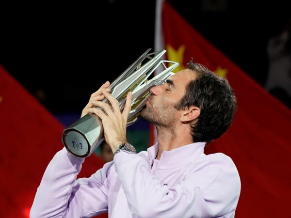 Roger Federer with the winner's trophy at the ATP Shanghai Masters