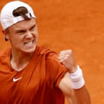 Denmark's Holger Rune reacts during his semi final match at the 2023 Italian Open