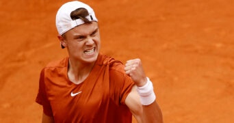 Denmark's Holger Rune reacts during his semi final match at the 2023 Italian Open