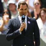 Switzerland's Roger Federer gives a speech during centre court centenary celebrations at Wimbledon 2022