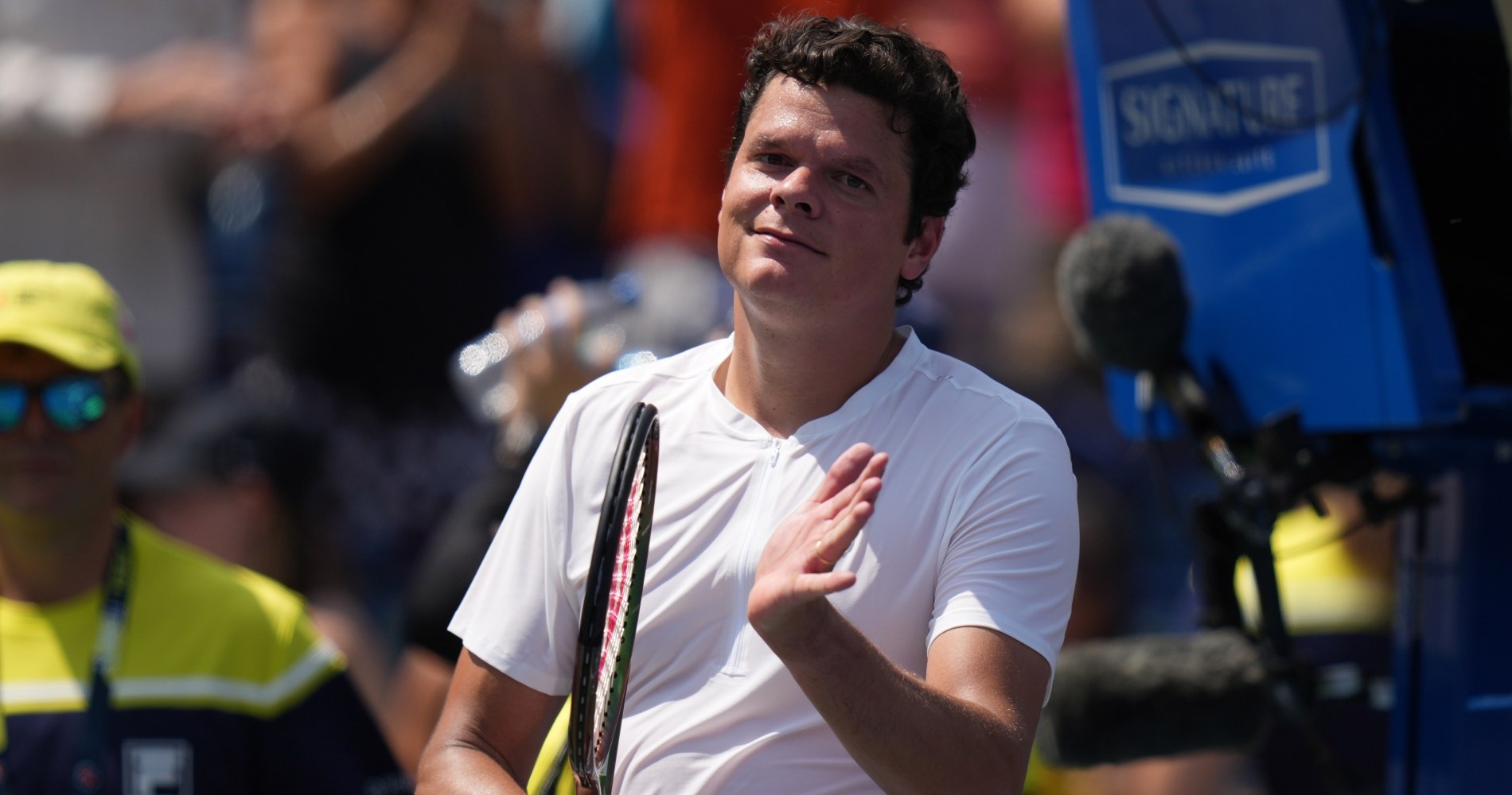 Raonic edges past Bautista Agut to reach last eight