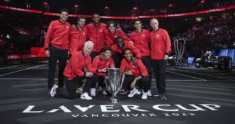 Team World poses with the Laver Cup trophy