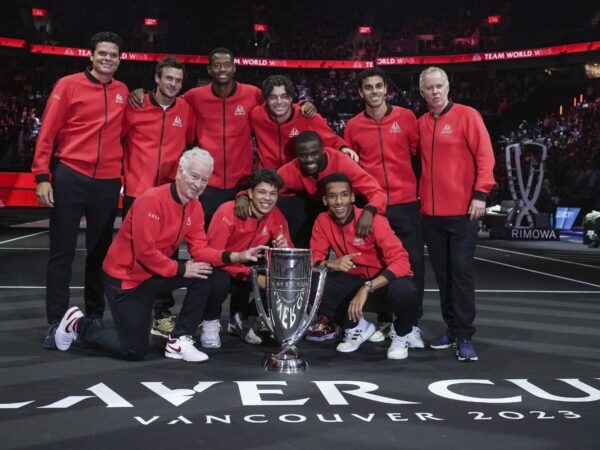 Team World poses with the Laver Cup trophy