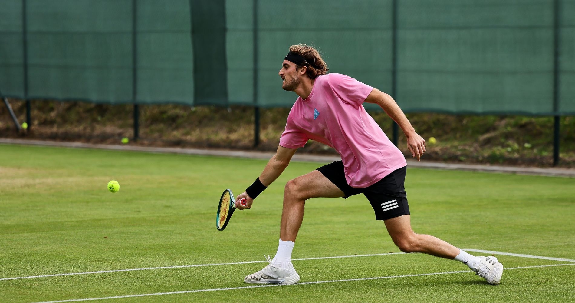 Tsitsipas edges past wildcard Squire to reach second round