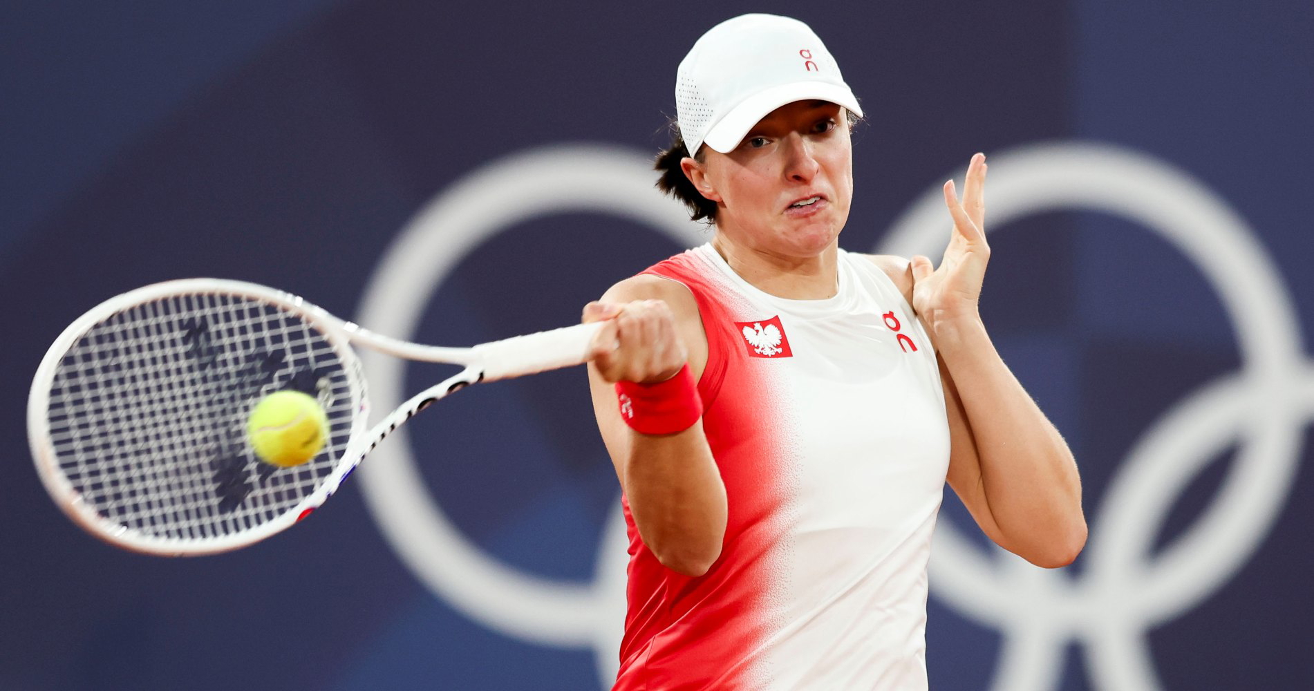 Swiatek survives early test to reach round two at Olympics Tennis Majors