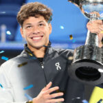 October 22, 2023, Tokyo, Japan - Ben Shelton of the United States raises the trophy of the Japan Open tennis championships at the Ariake Colosseum in Tokyo on Suniday, October 22, 2023. Shelton defeated Aslan Karatsev of Russia in the final. || 278424_0018