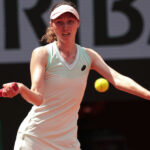 4th June 2024; Roland Garros, Paris, France; 2024 French Open Tennis tournament, Day 10; Cristina Bucsa (ESP) playing with Monica Niculescu (ROU), plays a forehand back to Emma Navarro (USA) and Diane Shnaider (RUS) || 291601_0046 2024 Clay French grand slam open paris Roland-Garros SPORTING sports tennis