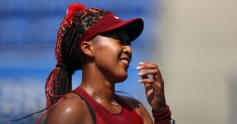 Ariake Tennis Park - Tokyo, Japan - July 25, 2021. Naomi Osaka of Japan celebrates after winning her first round match against Zheng Saisai of China