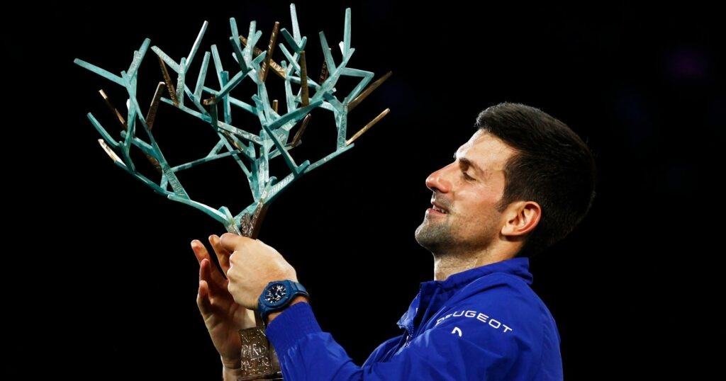 Novak Djokovic with the 2021 Rolex Paris Masters Trophy