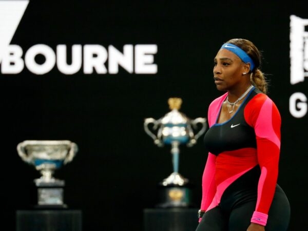 Serena Williams of the U.S. reacts after winning the first set during her quarter-final match against Romania's Simona Halep