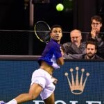 Arthur Fils hits a forehand during his match against Fabio Fognini at the quallies of Rolex Paris Masters 2022