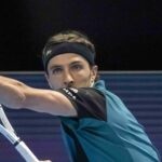 Arthur Rinderknechs hits a forehand against Marin Cilic in Basel in 2022