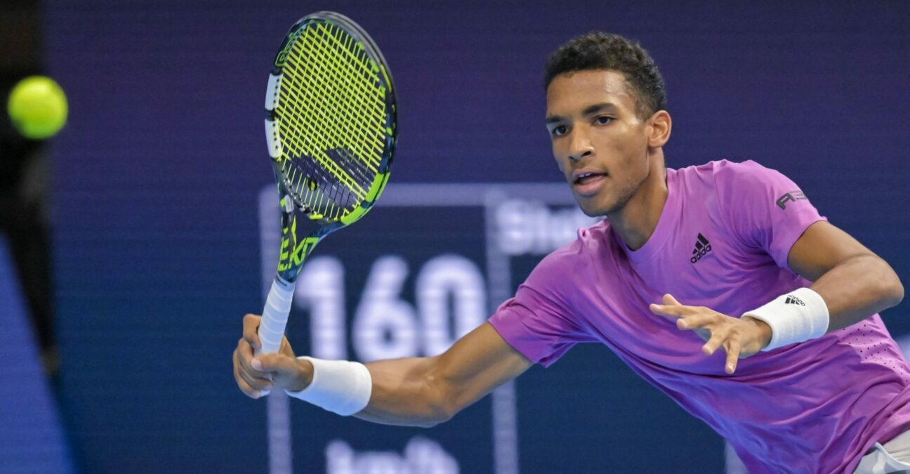 Felix Auger-Aliassime hits a forehand return to Marc-Andrea Huesler at the first round of Basel in 2022