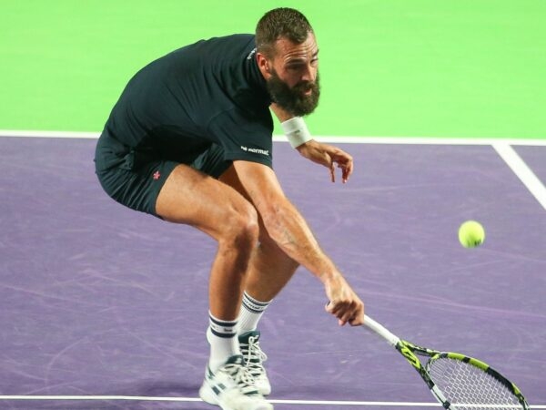 Benoît Paire hits a backhand volley during a match at the Challenger of Rennes in 2022