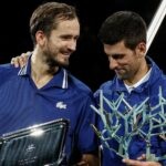 Daniil Medvedev and Novak Djokovic during the trophy ceremony after their final of Rolex Paris Masters in 2021
