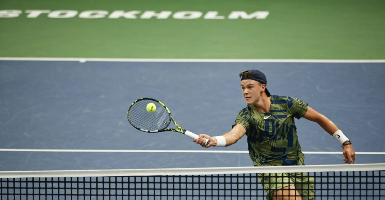 Holger Rune hits a forehand dropshot volley during his semi final against de Minaur in Stockholm in 2022