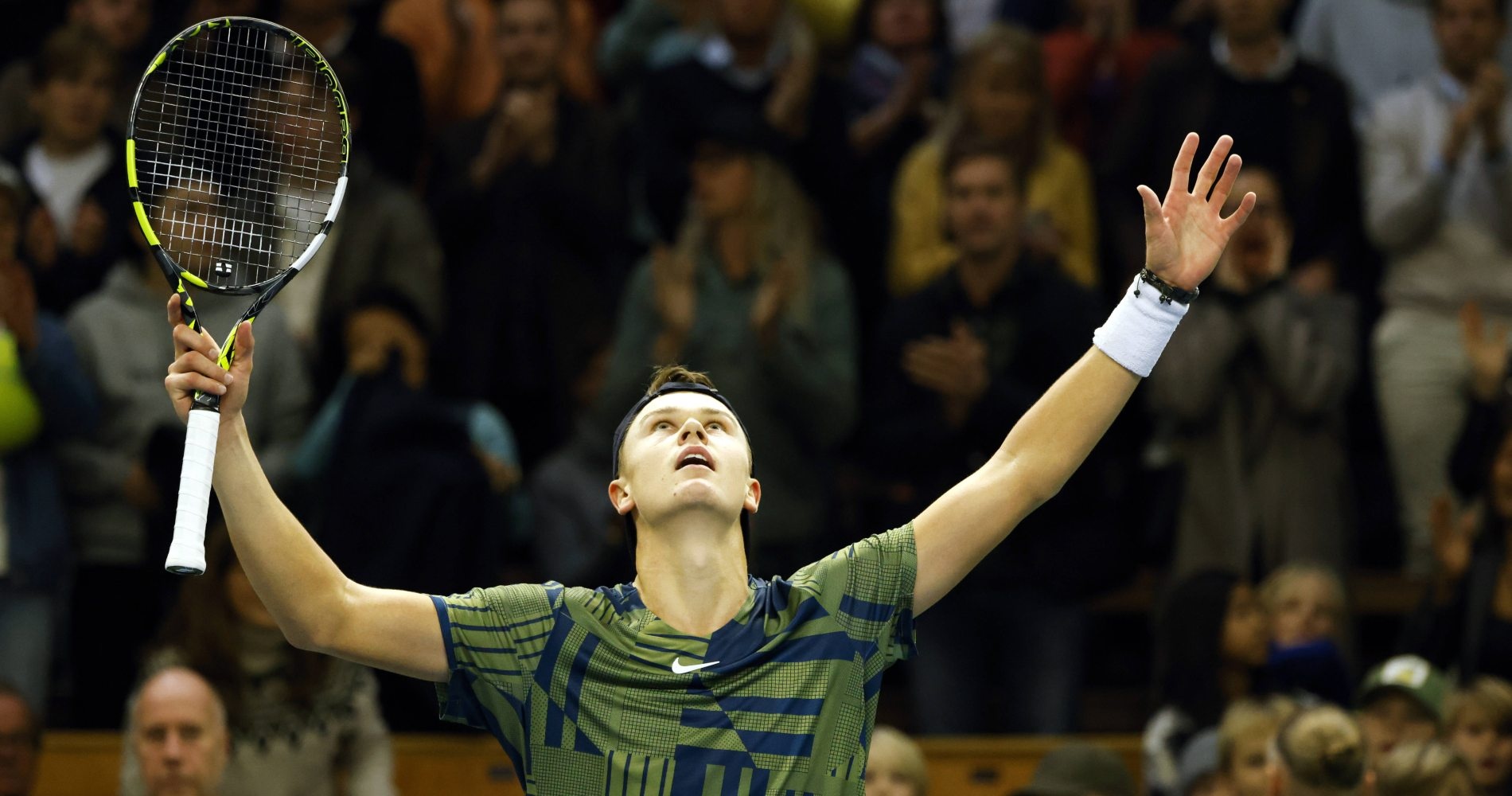 Holger Rune celebrates after beating Alex De Minaur in the semis of Stockholm in 2022