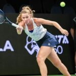 Jessika Ponchet from France hitting a forehand return in Tallin in 2022.