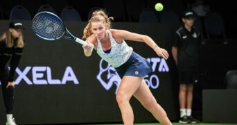 Jessika Ponchet from France hitting a forehand return in Tallin in 2022.