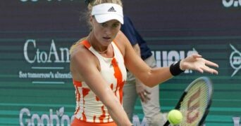 Kristina Mladenovic hitting a slice bakhand during a match in Seoul in 2022