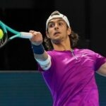 Lorenzo Musetti hits a forehand in Basel in 2022