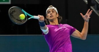 Lorenzo Musetti hits a forehand in Basel in 2022