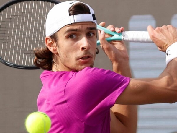 Lorenzo Musetti hits a backhand during his semi-final against Miomir Kecmanovic in Serbia