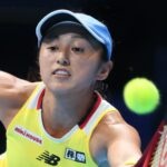 Misaki Doi returns during a match in Tokyo in 2022