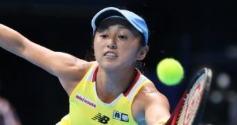 Misaki Doi returns during a match in Tokyo in 2022