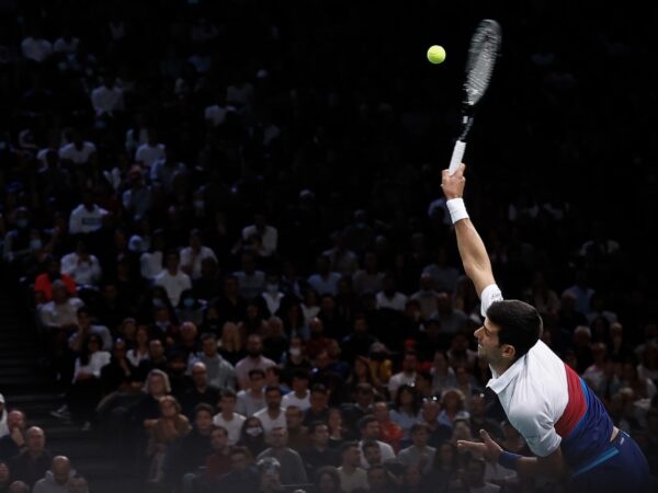 Novak Djokovic hits a serve during the finale of the Rolex Paris Masters 2022 against Daniil Medvedev.