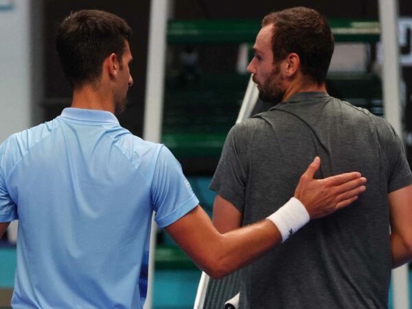 Novak Djokovic hanshake with Russian Roman Safiullin in Tel Aviv in 2022Tel Aviv 2022