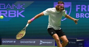 Stefanos Tsitsipas hits a slice backhand agains Novak Djokovic during the final of the tournament of Astana in 2022