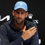 Novak Djokovic Open d'Australie conférence de presse casquette bouteille d'eau